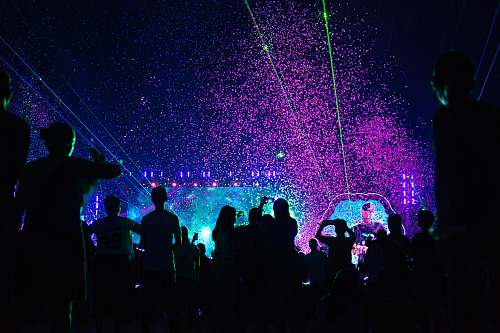 leisure activities people at the rave party at night crowd